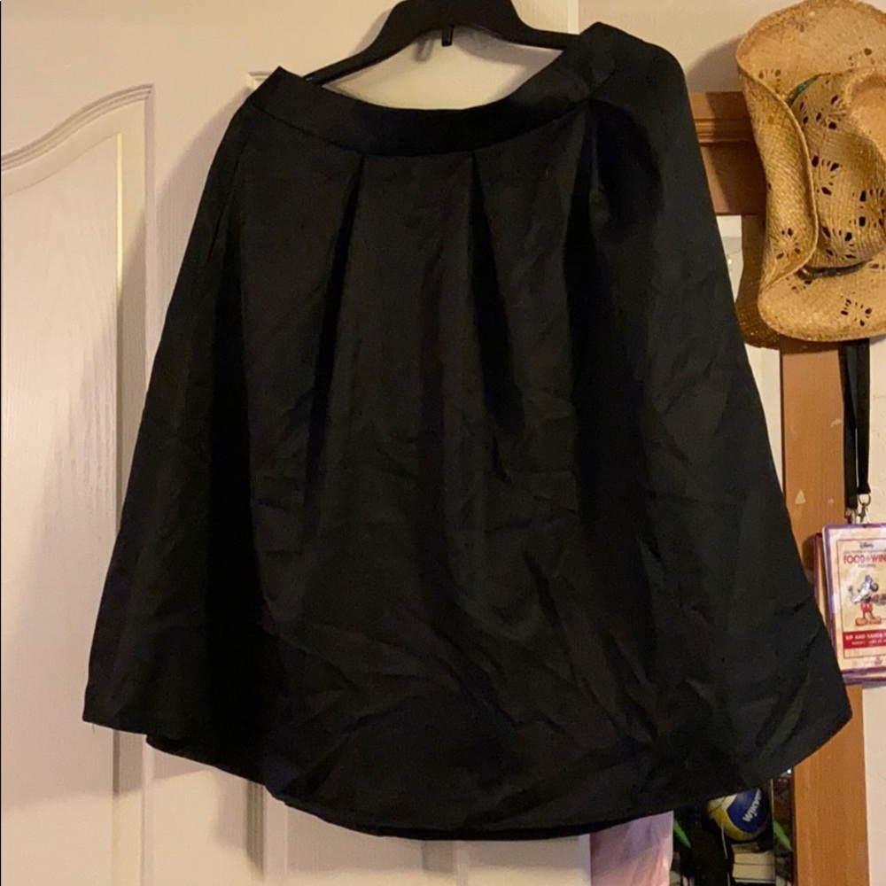 Knee length black skirt